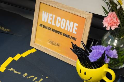 Articulation agreement signing event welcome sign