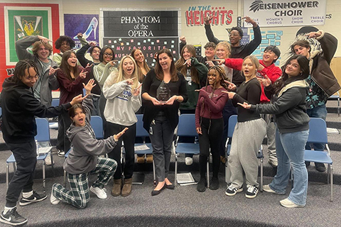 A large group of people posing for the camera.