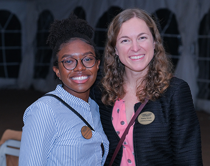 Two people smiling for a photo