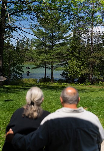 A couple sitting looking at the landscape