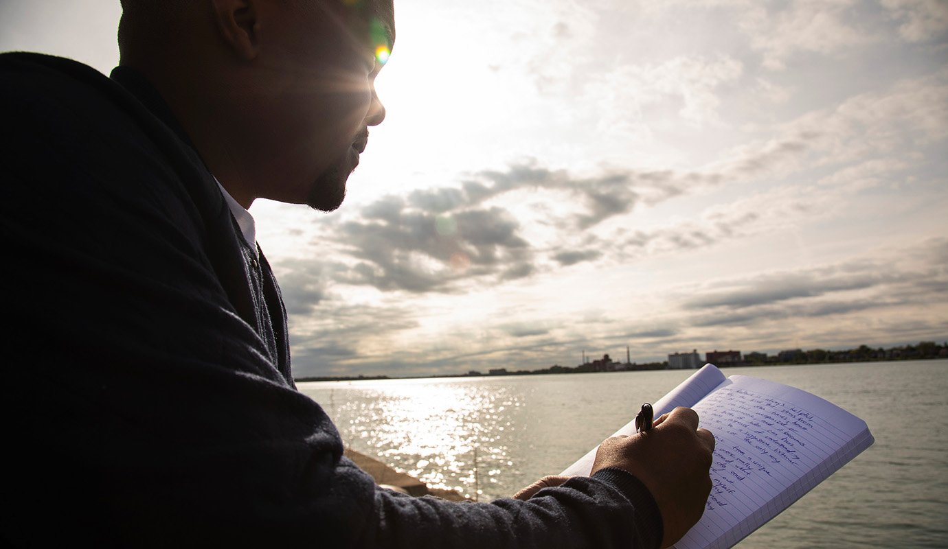 A man with a notebook