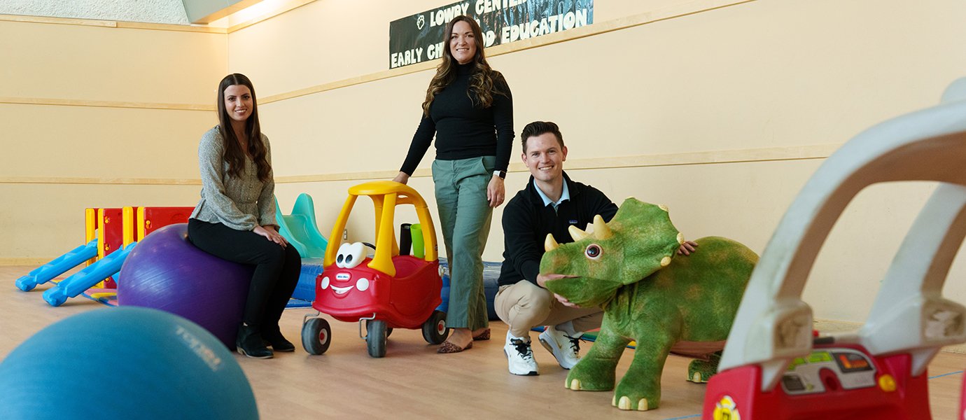 Three people with toys