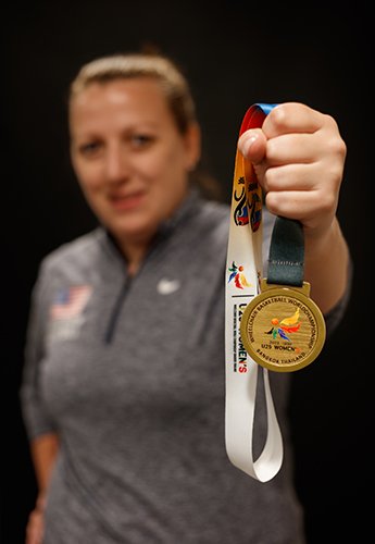 Kate Rougeau holding a medal