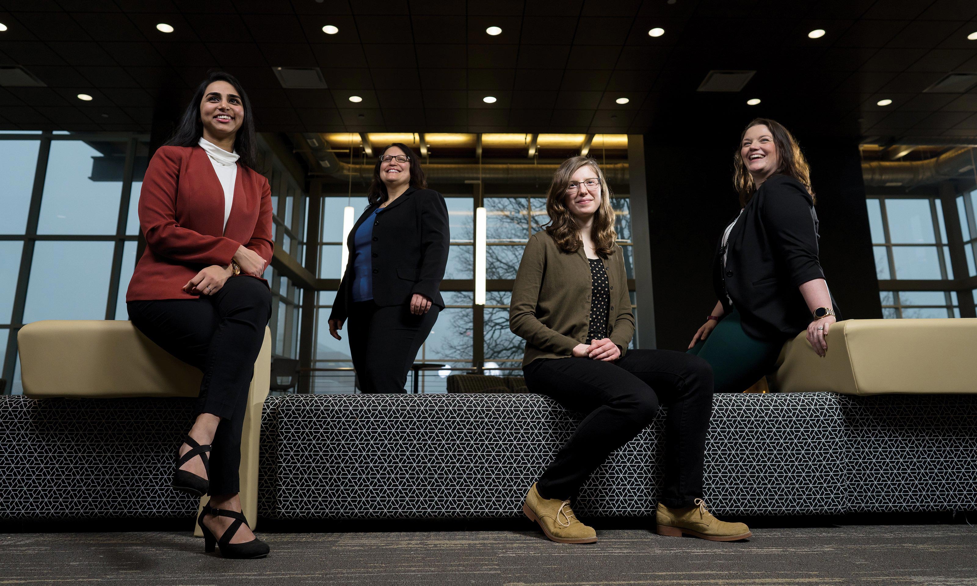 Four women on a couch