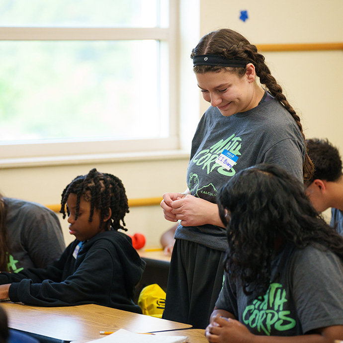 Mentor working with students