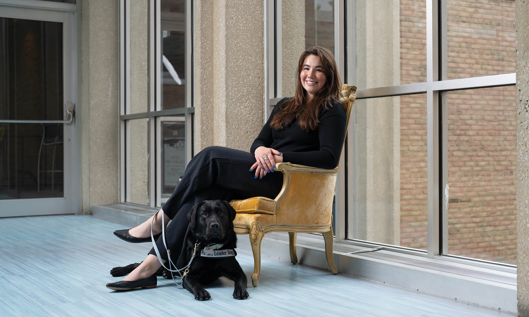Woman in chair with dog