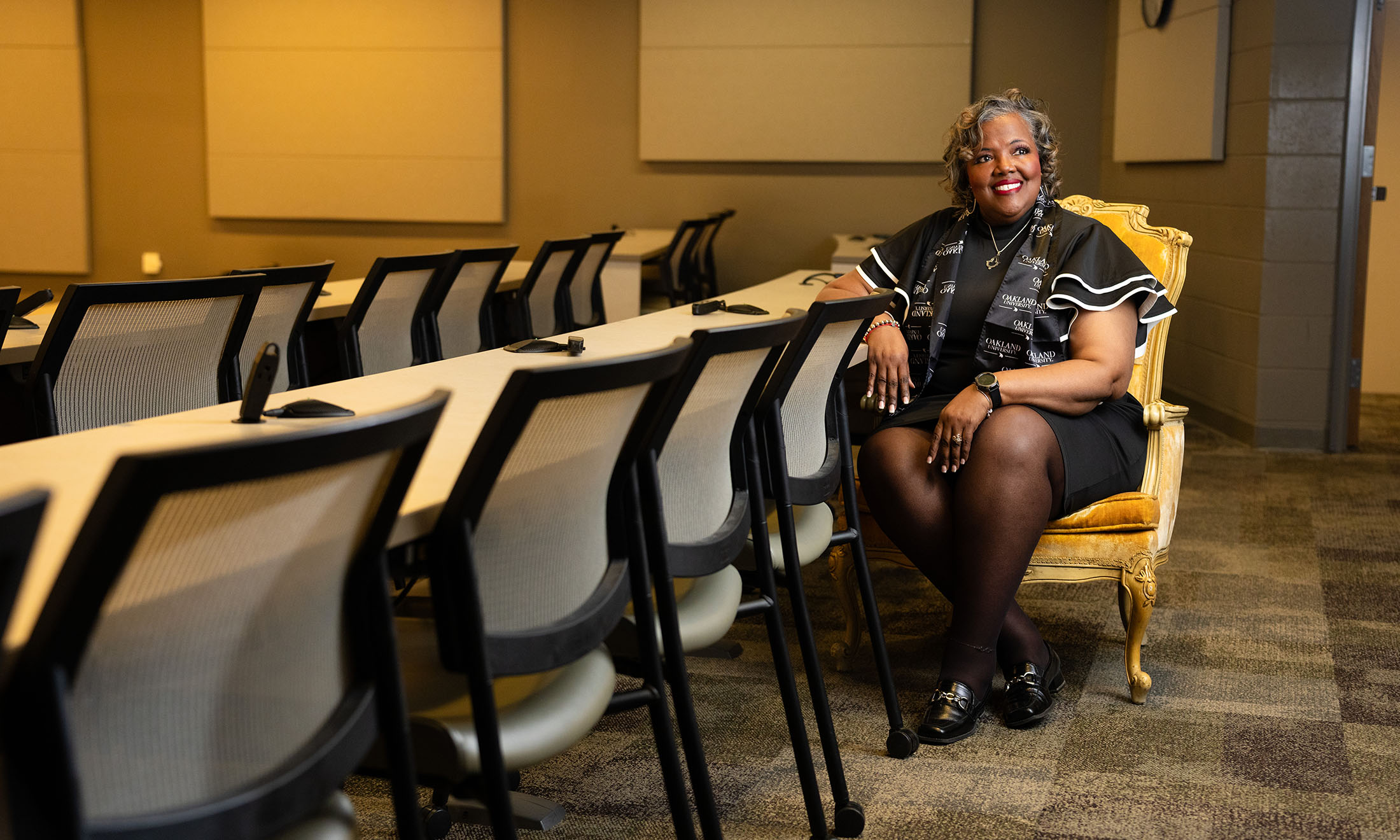 Woman sitting in classroom