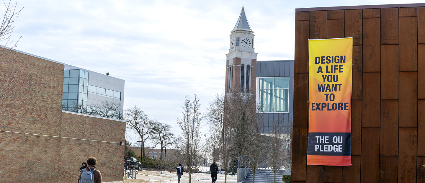 A banner on Oakland University's campus that says 