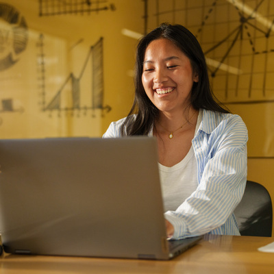 Aliyah Vue working at a laptop
