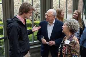 An OUWB student talks with donors