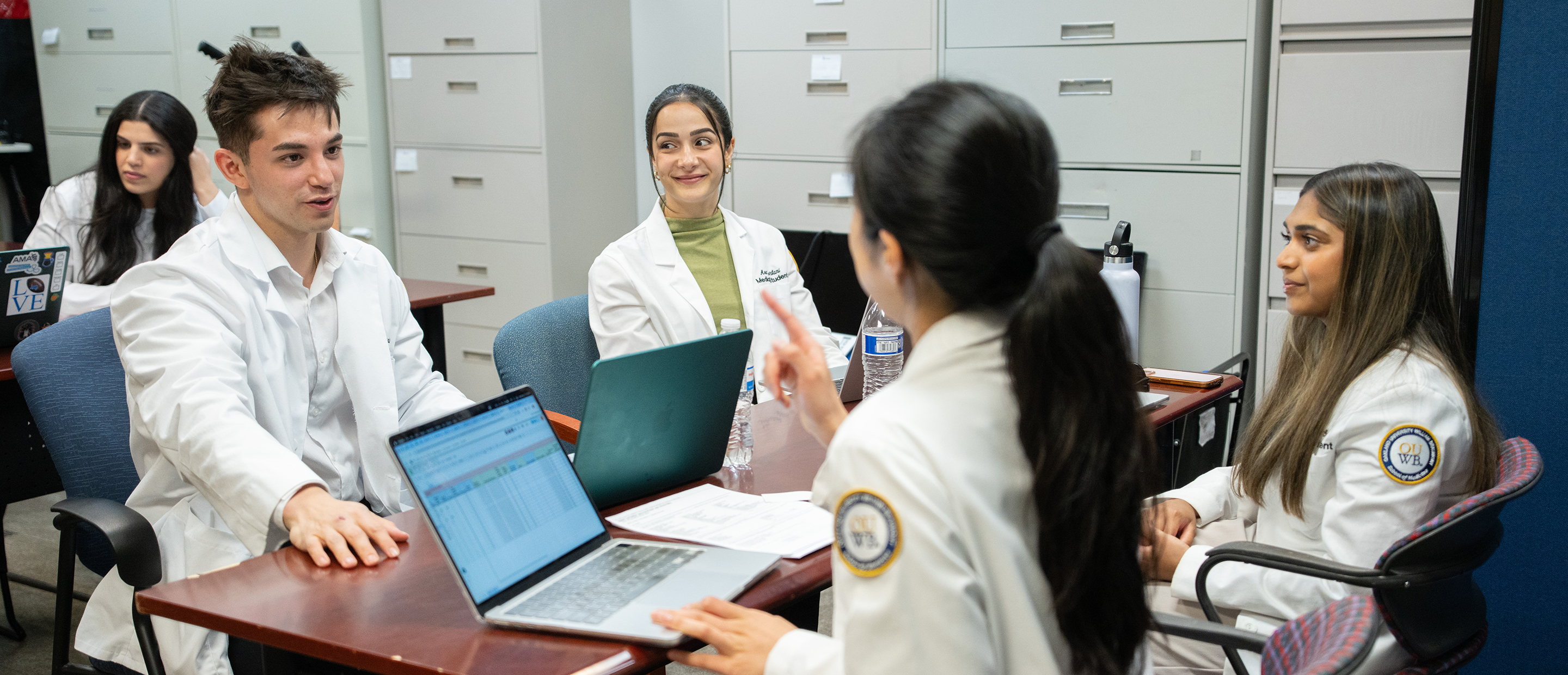 An image of students at their computers