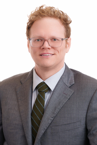 Michael Risner smiling at the camera