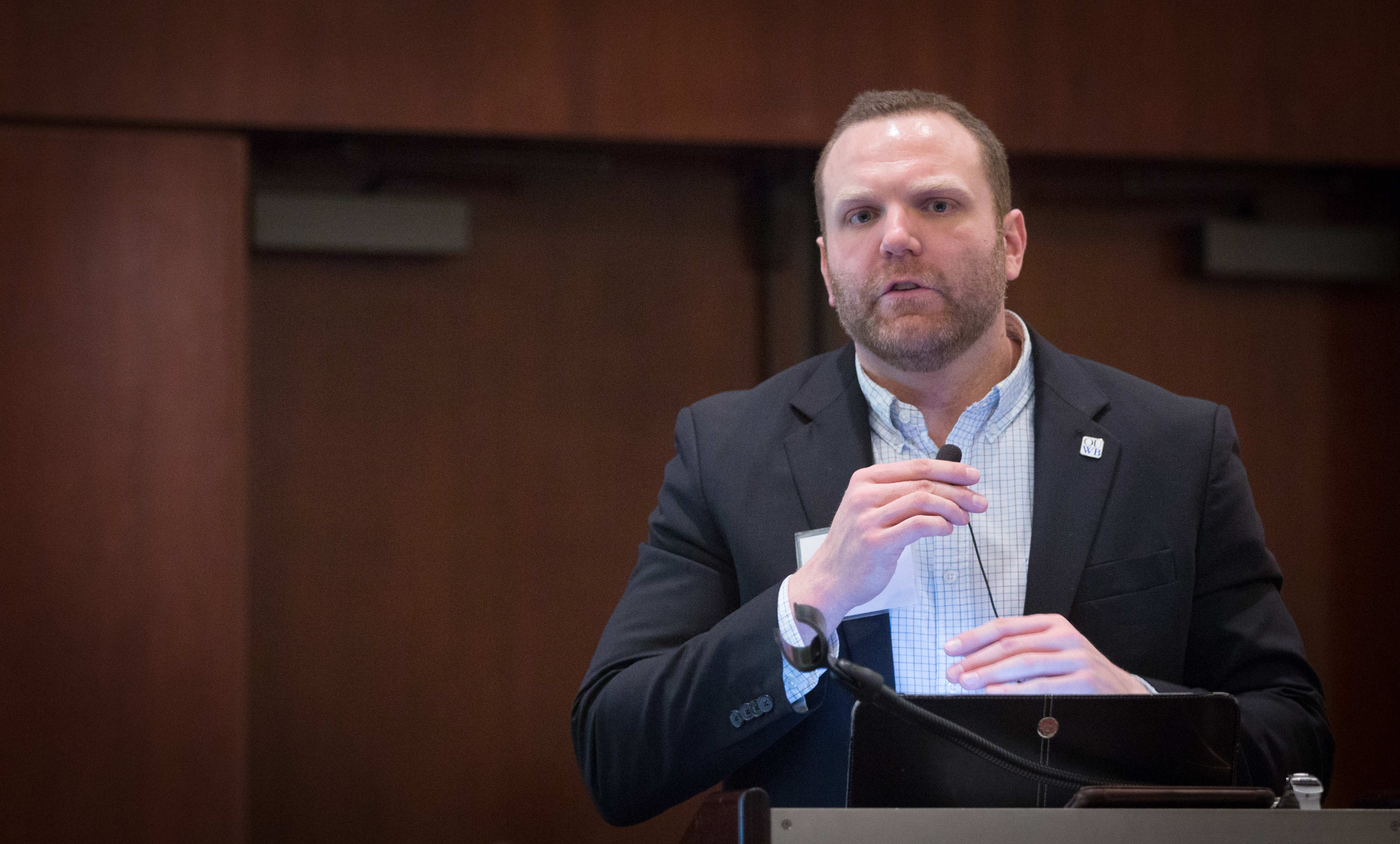 An image of a person at a podium