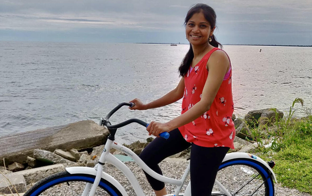 An image of Dr. Naik on a bike