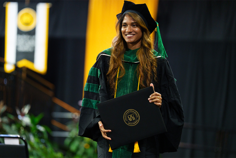 An image of a student at commencement