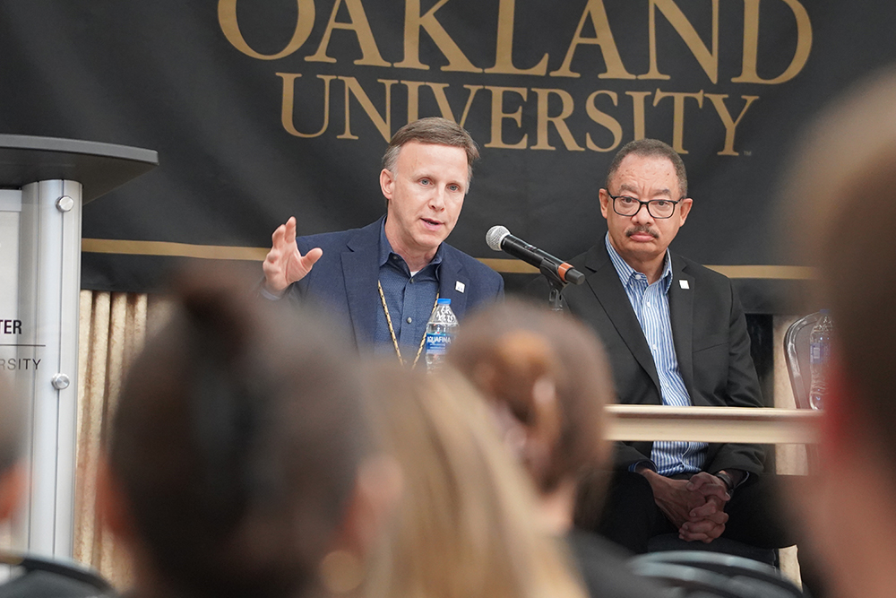 An image of Drs. Carpenter and Morris sitting at a table