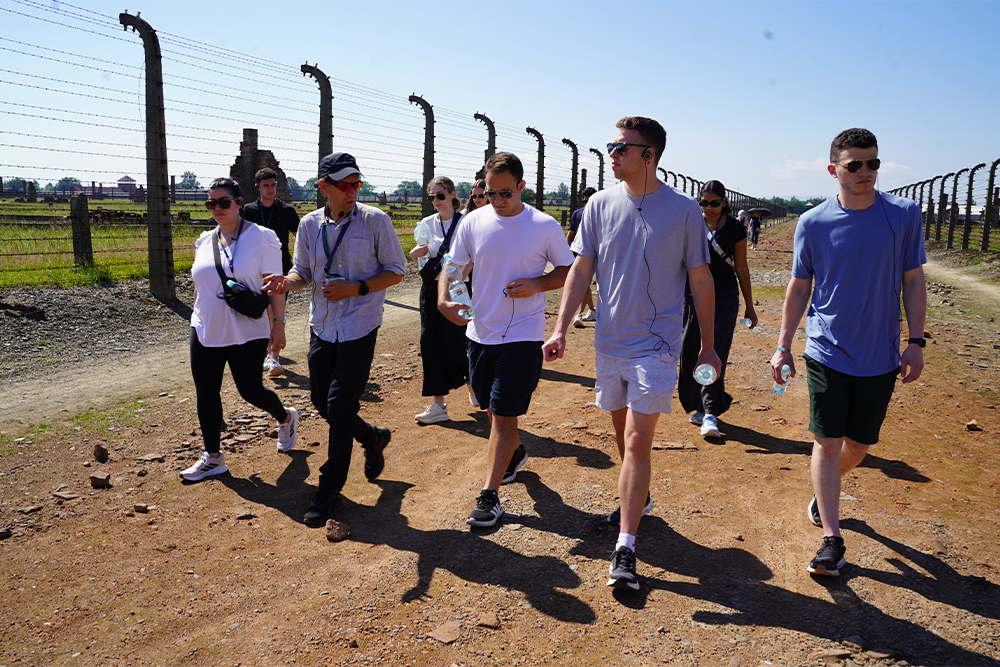 The OUWB cohort walks through Auschwitz-Birkenau