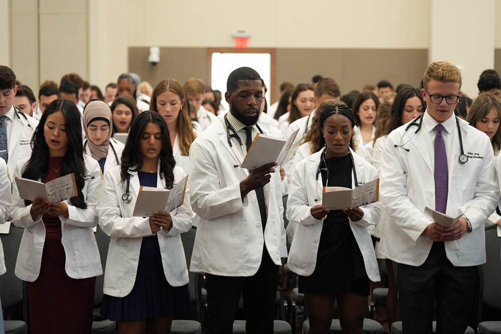 Students recite the Oath of Geneva