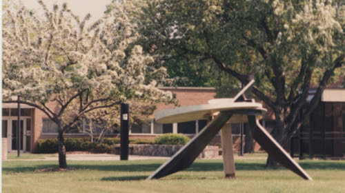 Image of a sculpture in front of a building