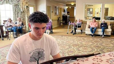 student performing piano in a senior living facility
