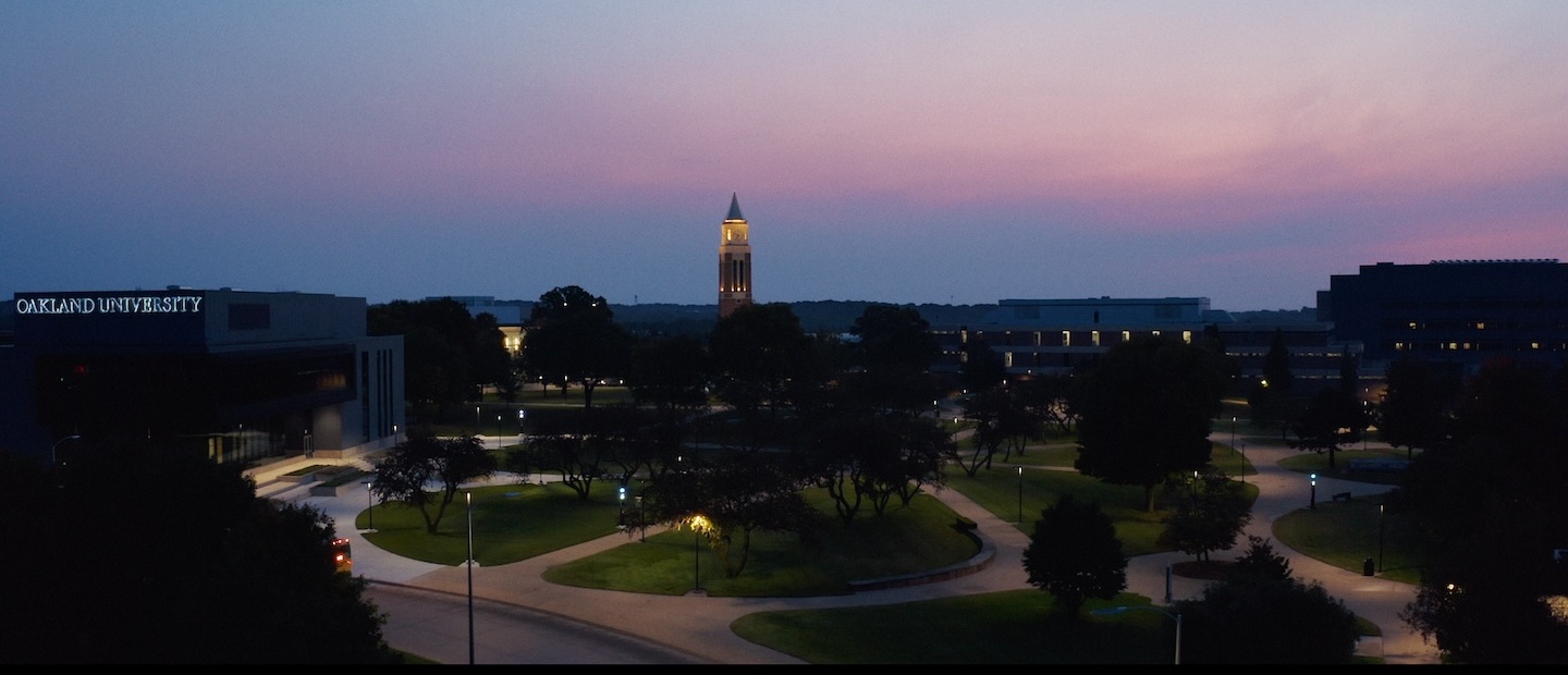 An aerial photo of OU at dusk