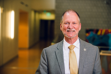 image of Dean Kevin Ball standing in the Human Health Building