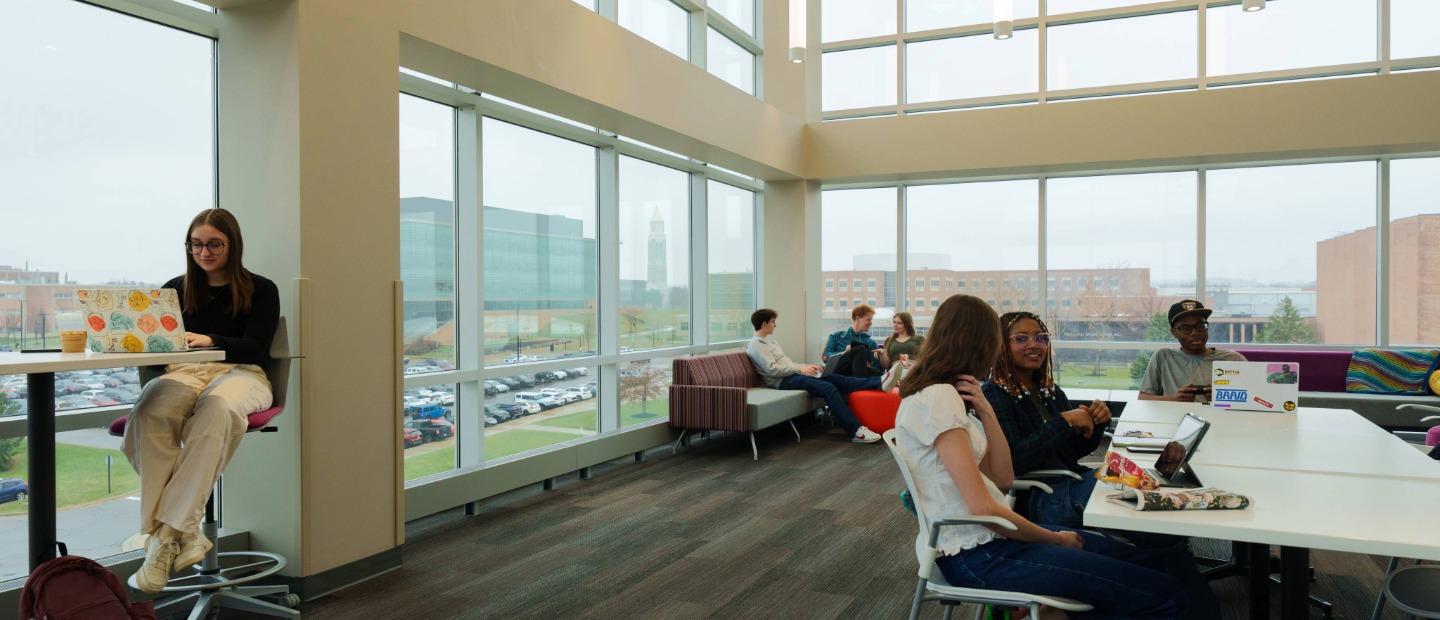 A group of Oakland University students in a common area on campus